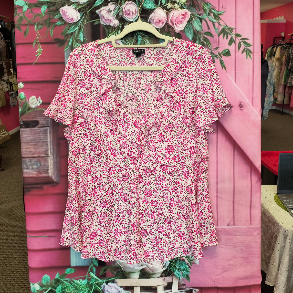 D) Torrid top L 10/3/26